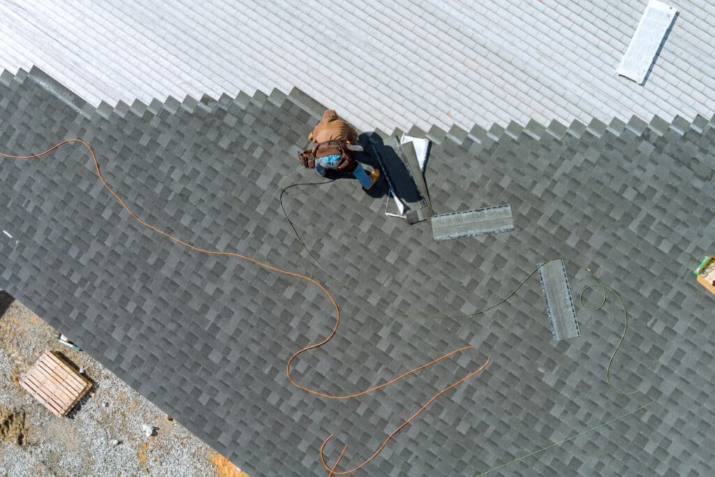 Asphalt shingle roof installation aerial view